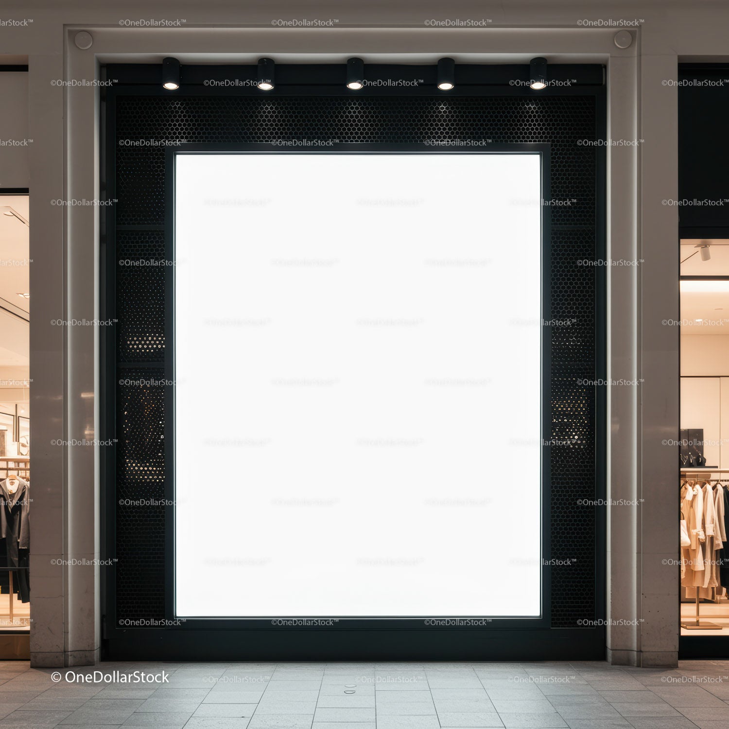 Large illuminated blank storefront billboard at mall entrance
