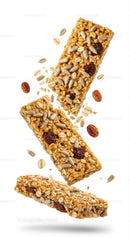 Healthy granola bars with seeds and dried fruit on white