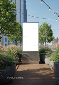 Modern outdoor billboard surrounded by urban greenery