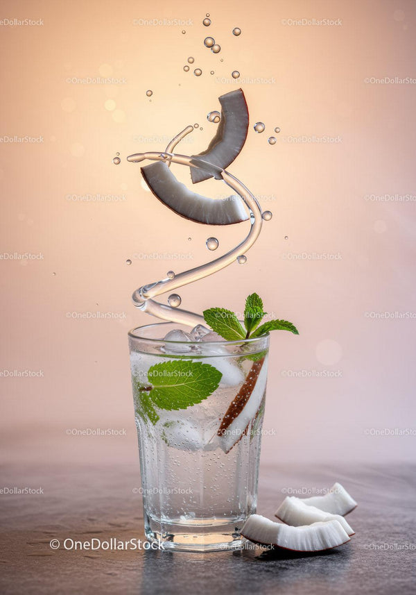 Refreshing Coconut Water with Mint and Ice Cubes