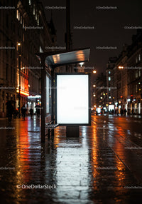 Night City Street with Illuminated Bus Stop and Neon Signs