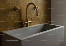 Concrete Bathroom Sink with Brass Faucet in Modern Interior