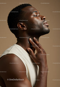 Close-Up of African American Man Applying Moisturizer for Healthy Skin