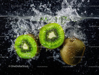 Fresh Kiwi Slices Splashing in Water Displaying Juicy Green Fruit