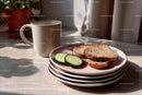 Simple Breakfast with Toasted Bread and Cucumber Slices in Natural Light