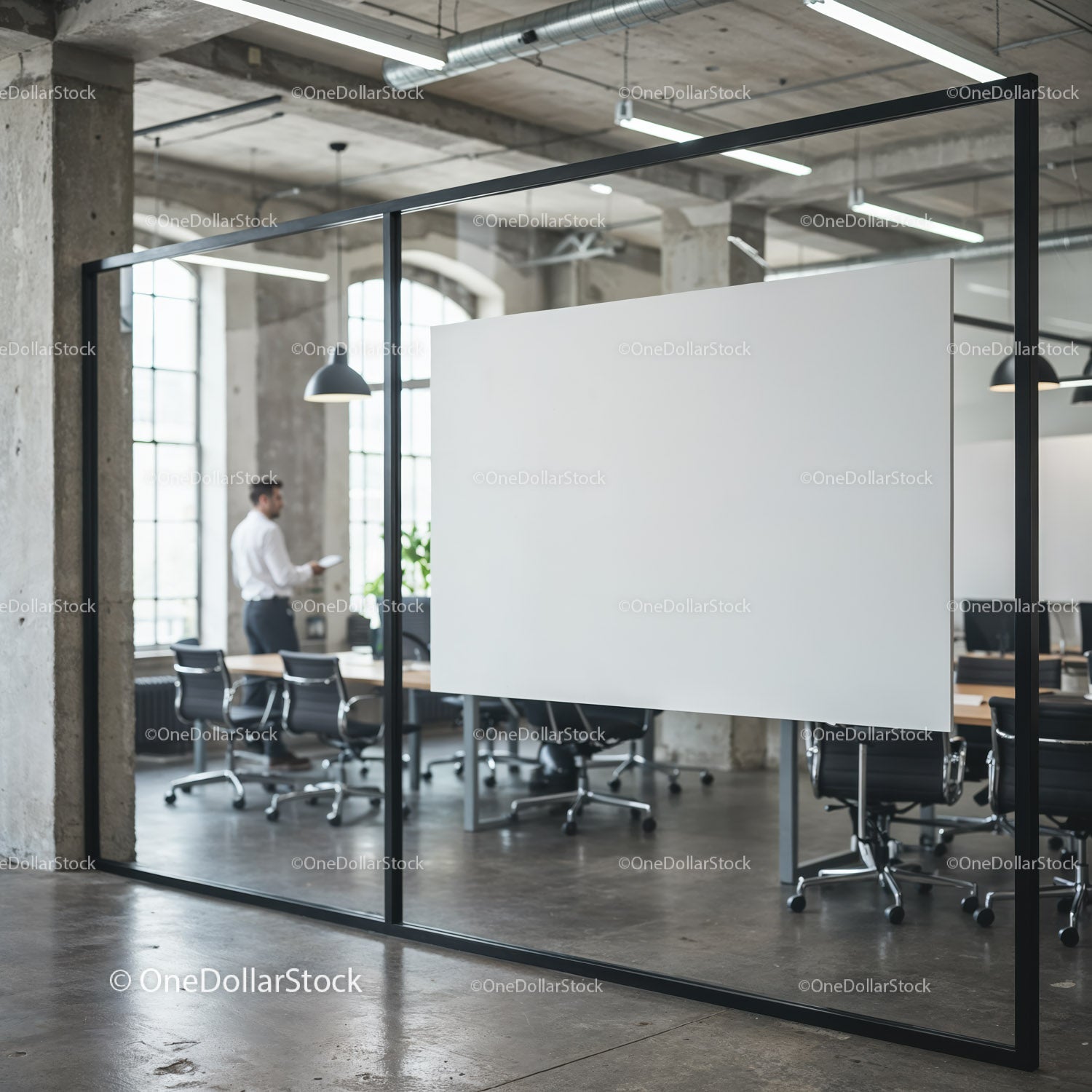 Modern industrial office with blank glass presentation board