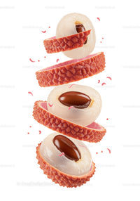 Fresh lychee fruit halves with textured red skin