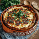 Seafood Shrimp Quiche with Fresh Herbs on Rustic Wooden Table