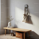 Minimalist Entryway with Wooden Bench and Beige Tote Bag