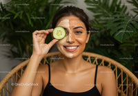 Young Woman with Face Mask and Cucumber Slice in Natural Setting