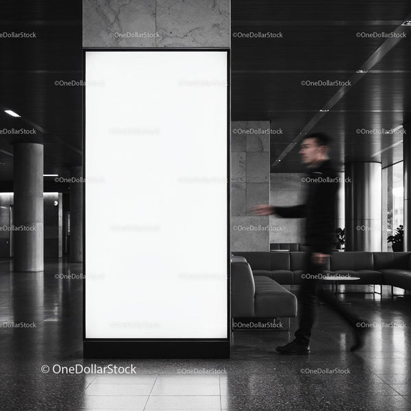 Blurred man walking past large blank indoor billboard JPG Mockup Image