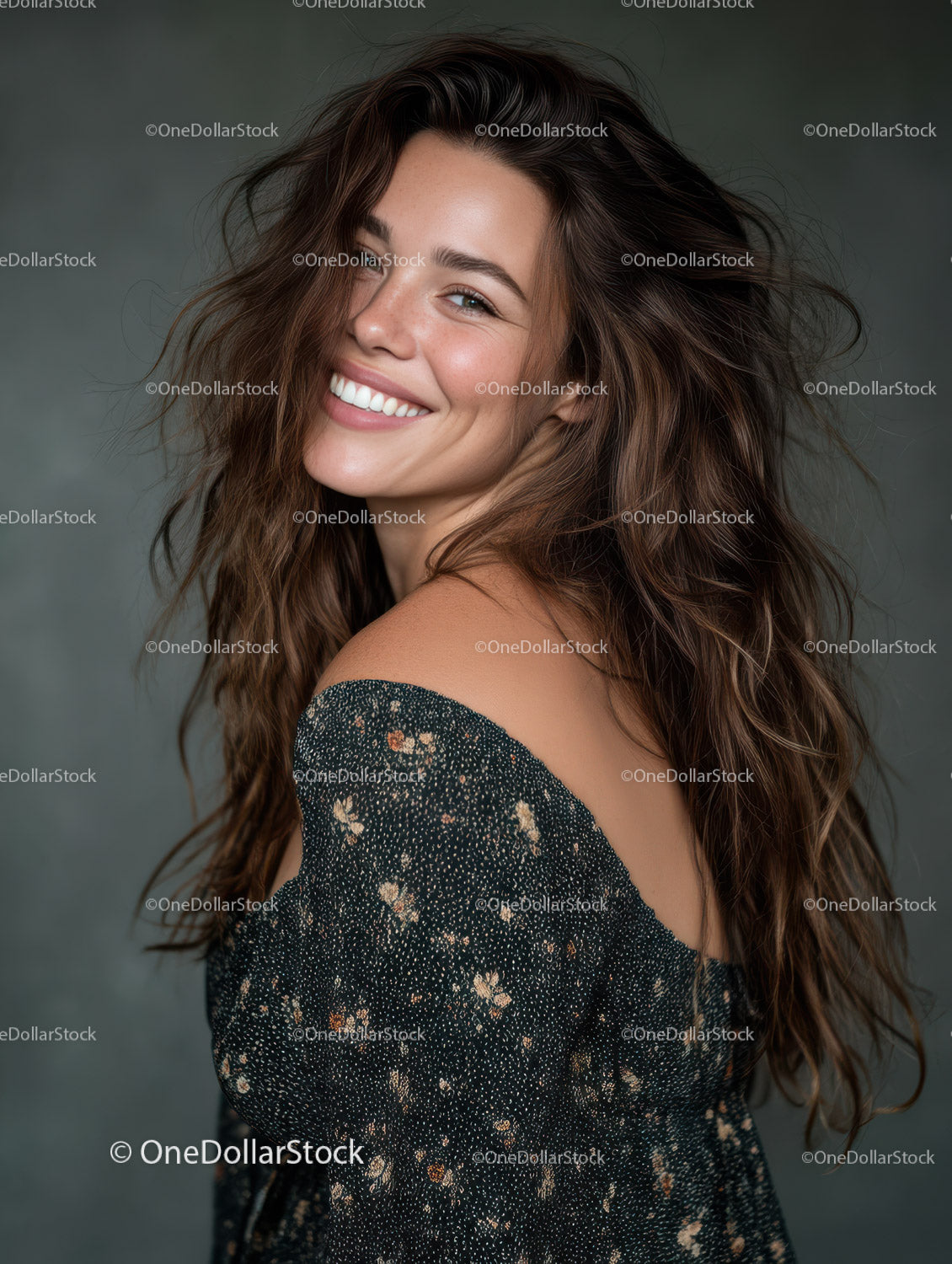Joyful Young Woman with Long Brown Hair Smiling in Studio Portrait