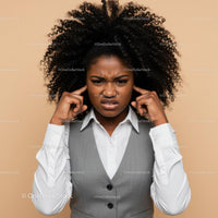 Frustrated Woman Covering Ears with Annoyed Expression