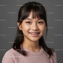 Young Girl Smiling with Braces Portrait Over Gray Background