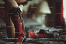 Chic Black Heels and a Red Lace Dress in a Cozy Bedroom Setting