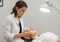 Skincare Treatment Session at Modern Dermatology Clinic with Woman Receiving Facial