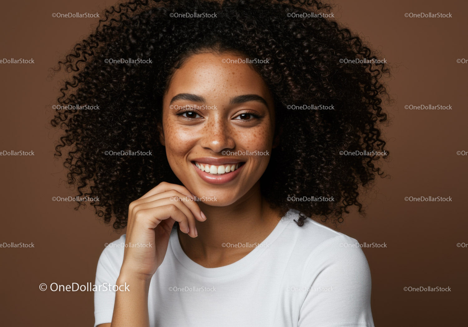 Portrait of Happy Young Woman with Curly Hair and Bright Smile