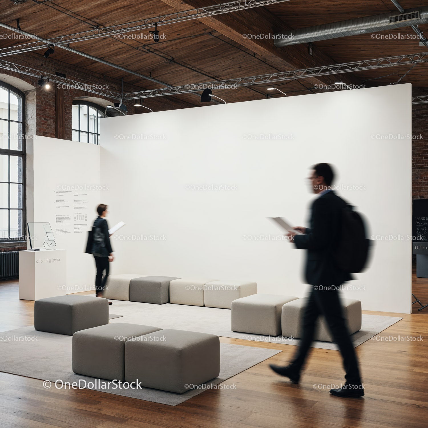 People exploring modern art gallery with minimal seating