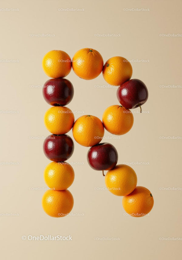 Letter R formed by fresh oranges and red apples