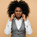 Frustrated Woman Covering Ears Expressing Annoyance Indoor