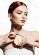 Elegant Female Portrait with Pear and Red Hair