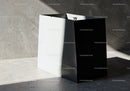 Minimalist black and white shopping bag in soft light