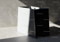 Minimalist black and white shopping bag in soft light