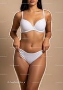 Elegant Woman in White Lingerie with Confident Pose on Beige Background