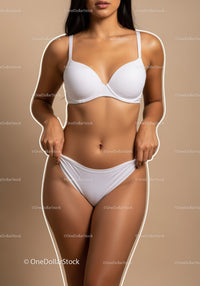 Elegant Woman in White Lingerie with Confident Pose on Beige Background