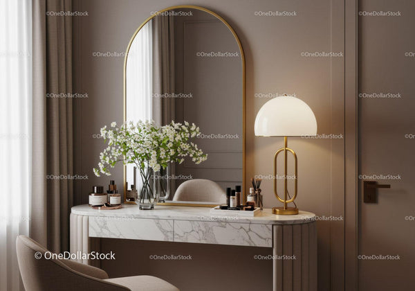 Elegant vanity with marble top and golden arched mirror