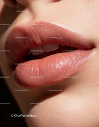 Close-up of soft natural lips with a subtle smile