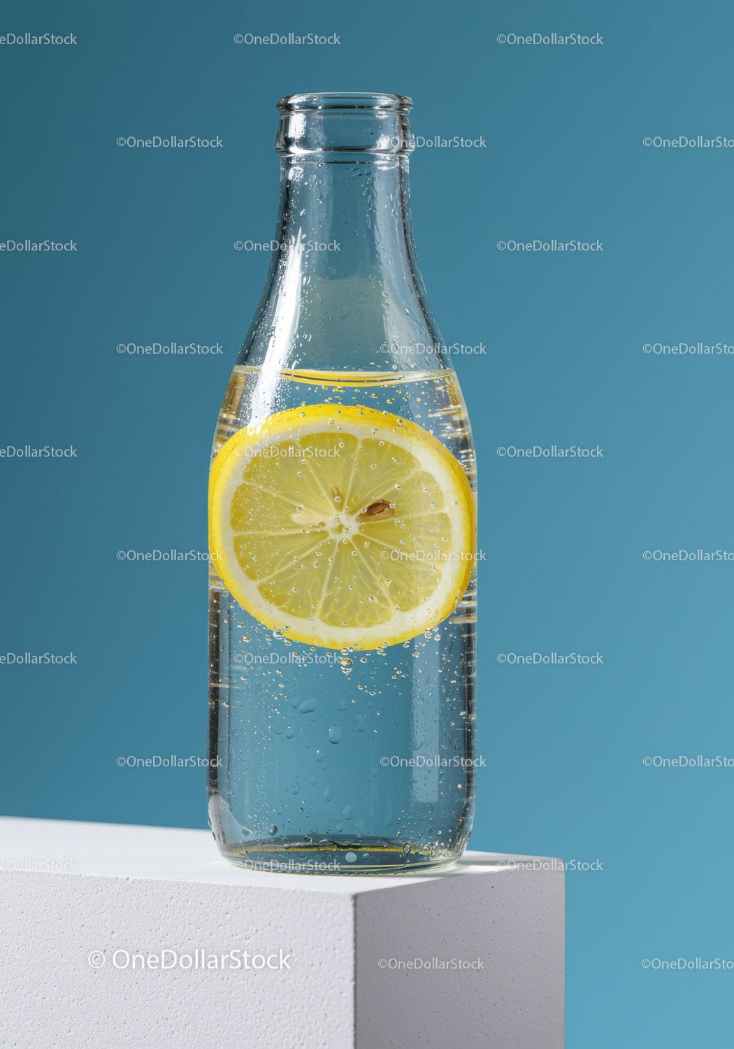 Refreshing Lemon Sparkling Water in Glass Bottle on Blue Background