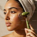 Young Woman Receiving Facial Massage with Jade Roller