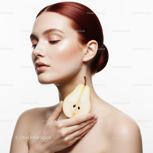 Elegant Woman with Red Hair Holding Pear on White Background
