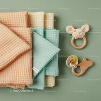 Neutral Colored Baby Blankets and Soft Teething Toys