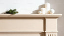 Minimalist Christmas decor on beige mantelpiece