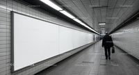 Minimalist Subway Tunnel with Tiled Walls and Modern Lighting