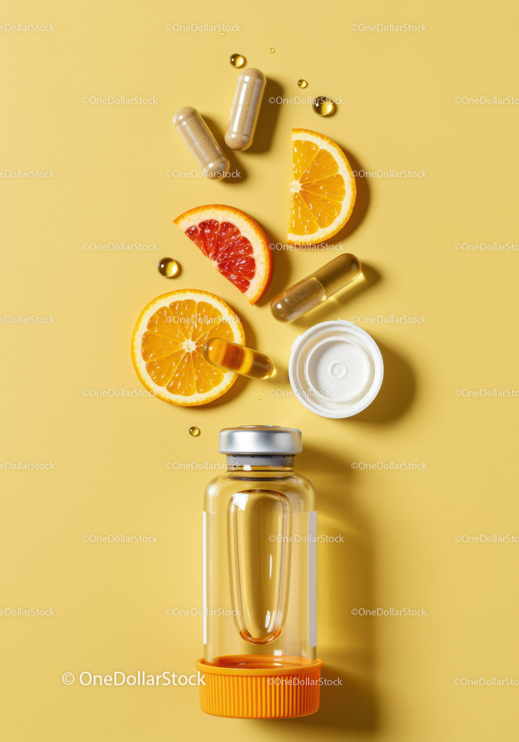 Vitamin supplements with citrus fruit slices on yellow background