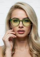 Fashionable Blonde Woman Wearing Green Glasses with Stylish Makeup