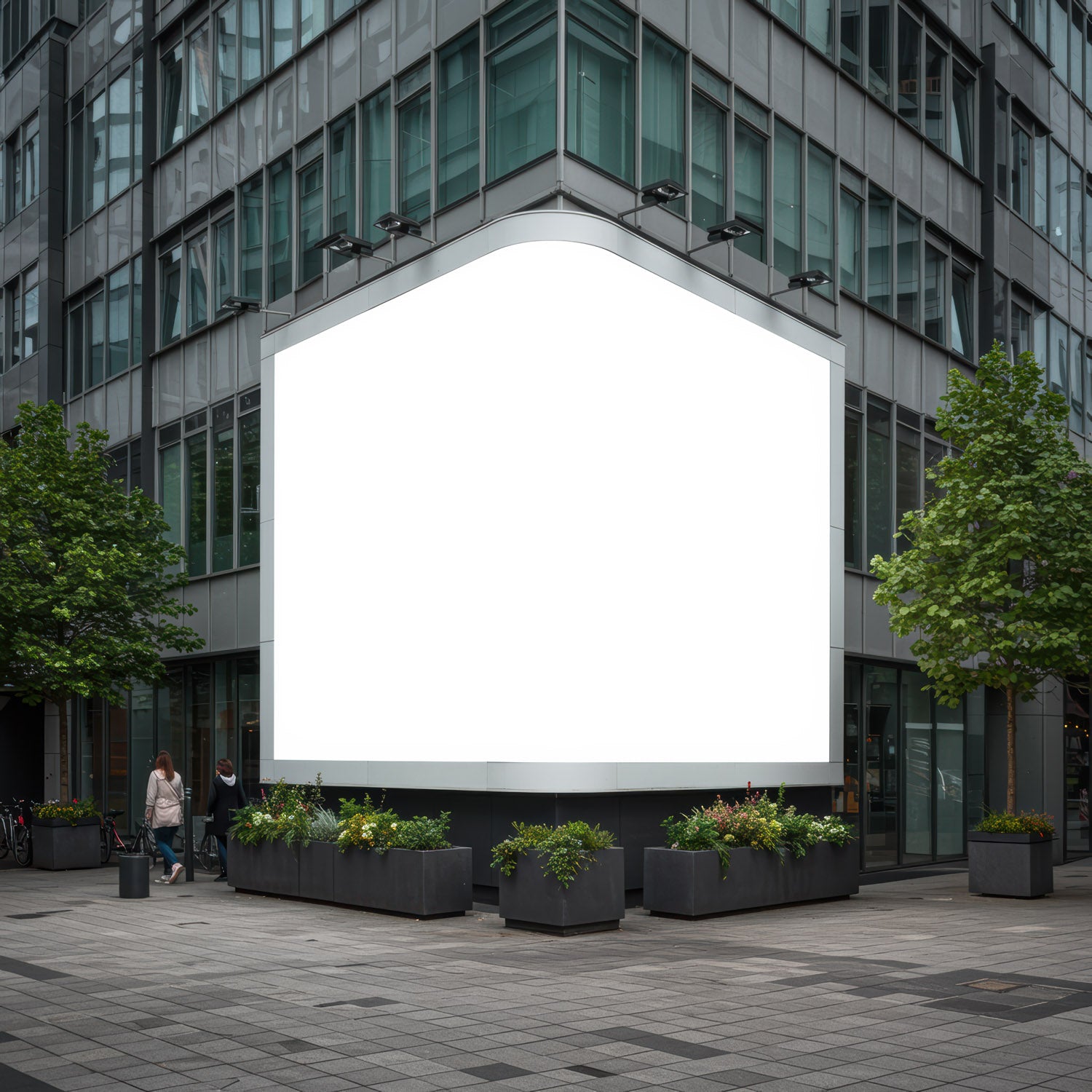 Blank billboard on modern office building corner