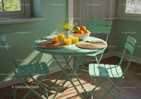 Sunlit breakfast nook with fresh orange juice and fruit bowl