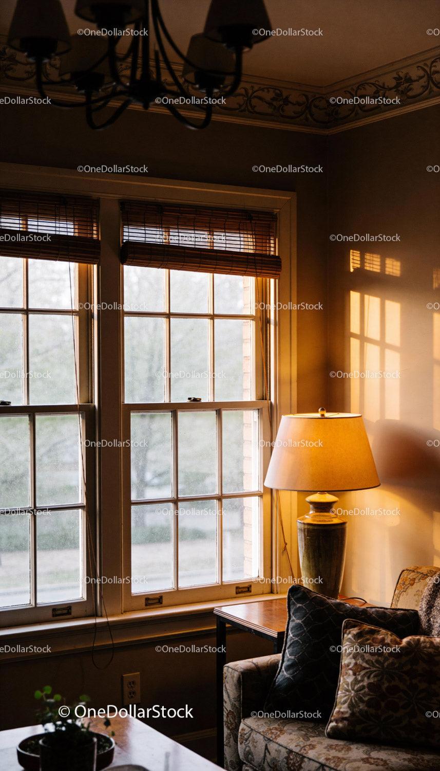 Cozy living room corner with warm evening sunlight