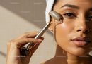 Close-up of a woman using jade roller for skincare on her face