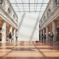 Spacious gallery hall with blank hanging poster display