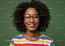 Vibrant Portrait of a Smiling Woman with Afro Hair and Glasses