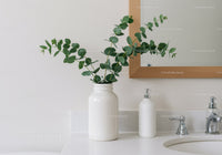 Green Eucalyptus Plant in White Vase Decorates Modern Bathroom