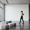 Minimalist interior with woman walking by modern seating