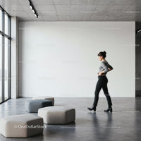 Minimalist interior with woman walking by modern seating