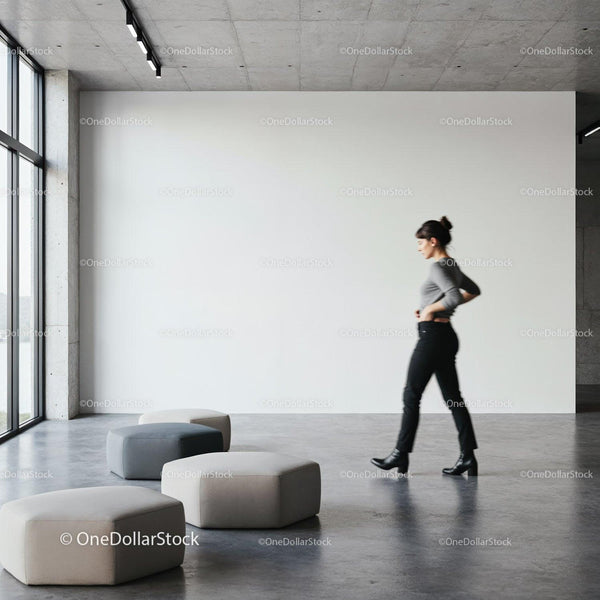 Minimalist interior with woman walking by modern seating JPG Mockup Image