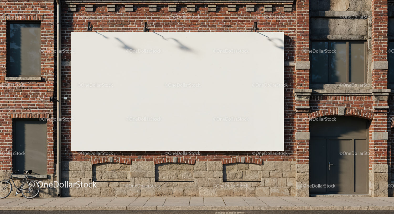 Empty white billboard on red brick building facade